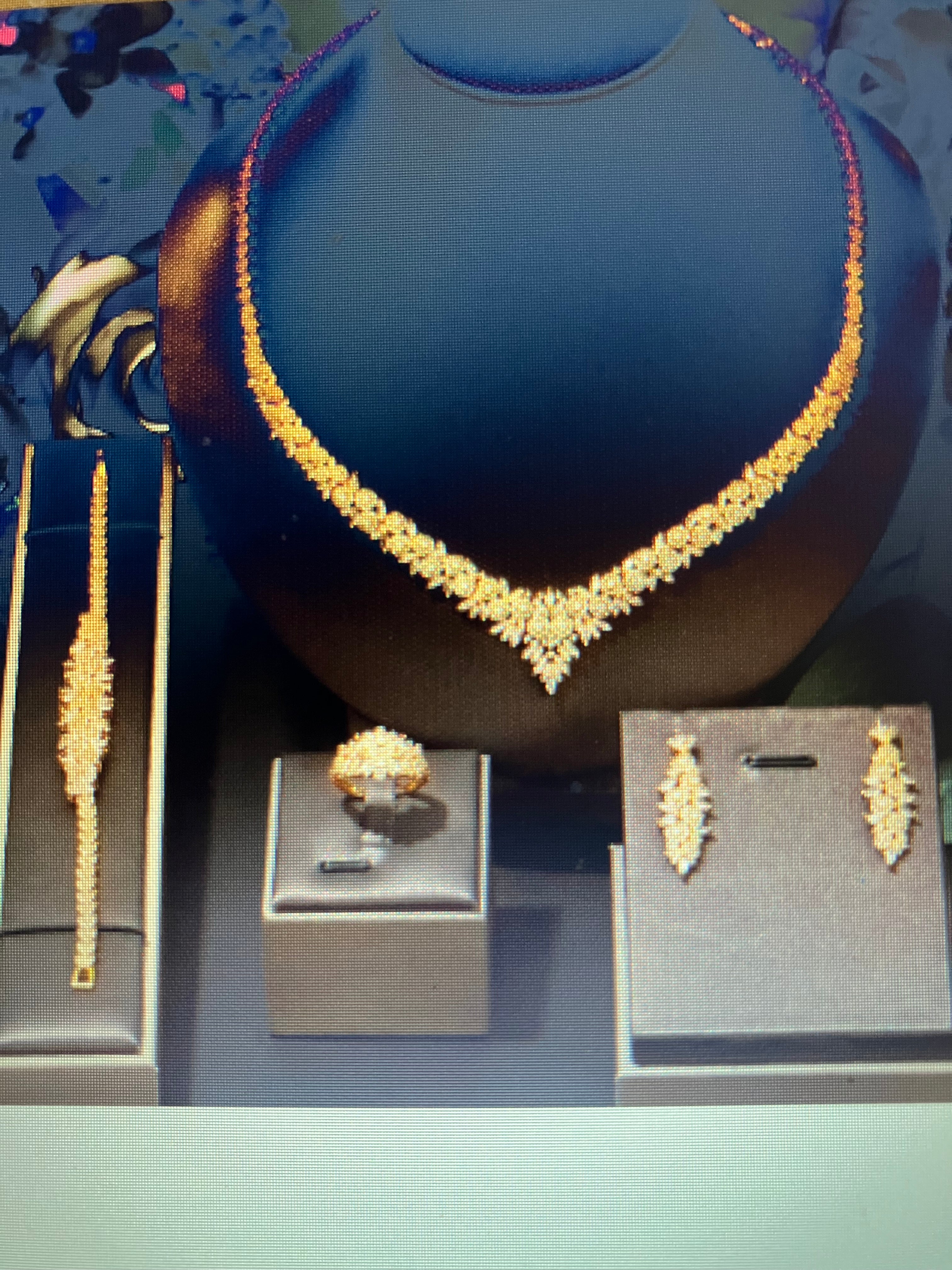 Beautiful 4 piece set, 18k gold  for the Discerning Black Woman